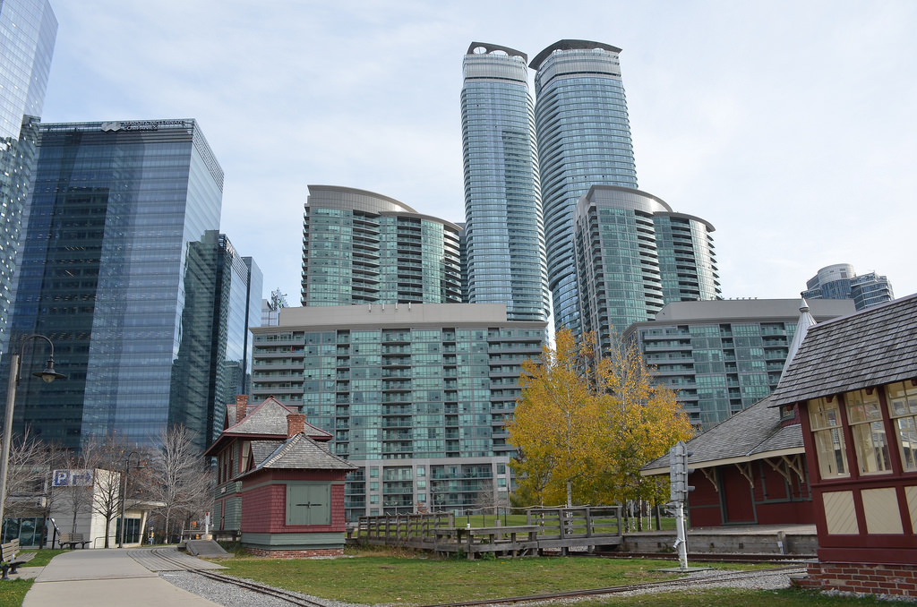 Faceless skyscrapers fill the coach yard by shankar s., on Flickr