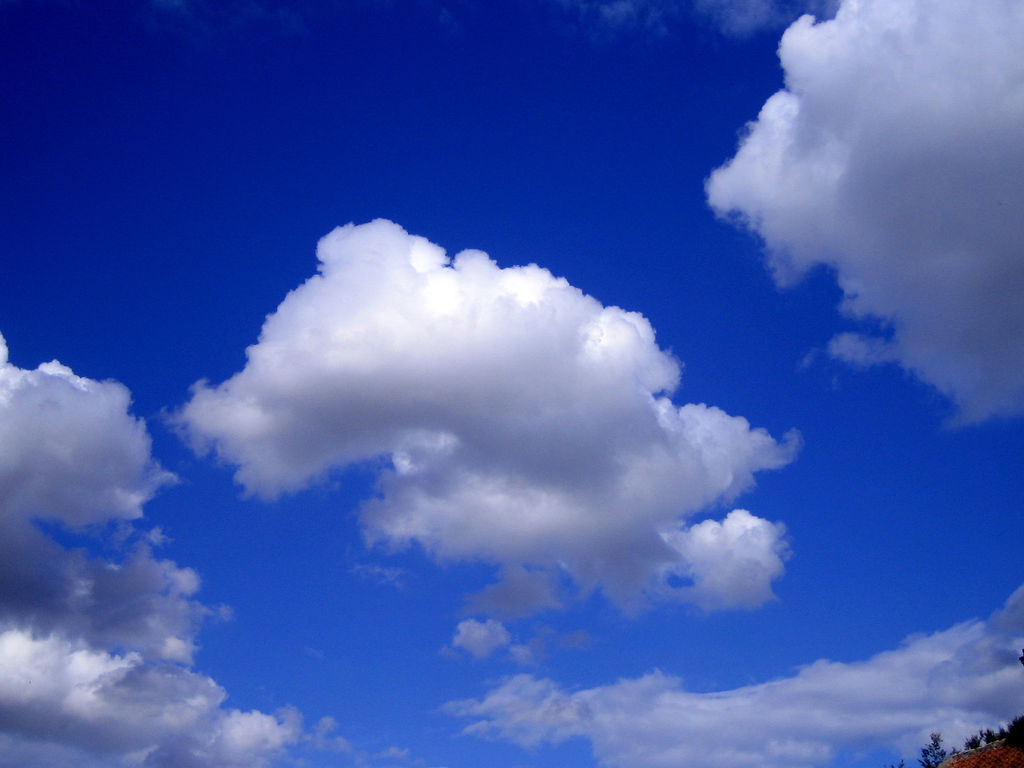 Puffy Clouds by monkeyatlarge, on Flickr